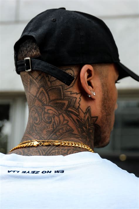 men's back of neck tattoo|unique neck tattoos men.